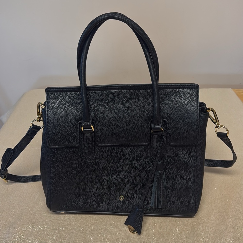 G I L I GILI Chic Black Leather Handbag with Tassel and brass accents.